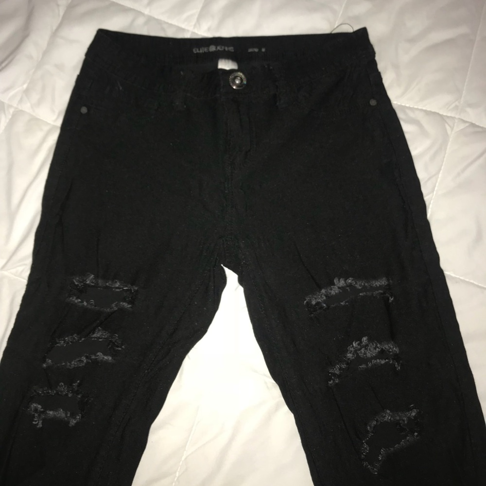 Black ripped pants